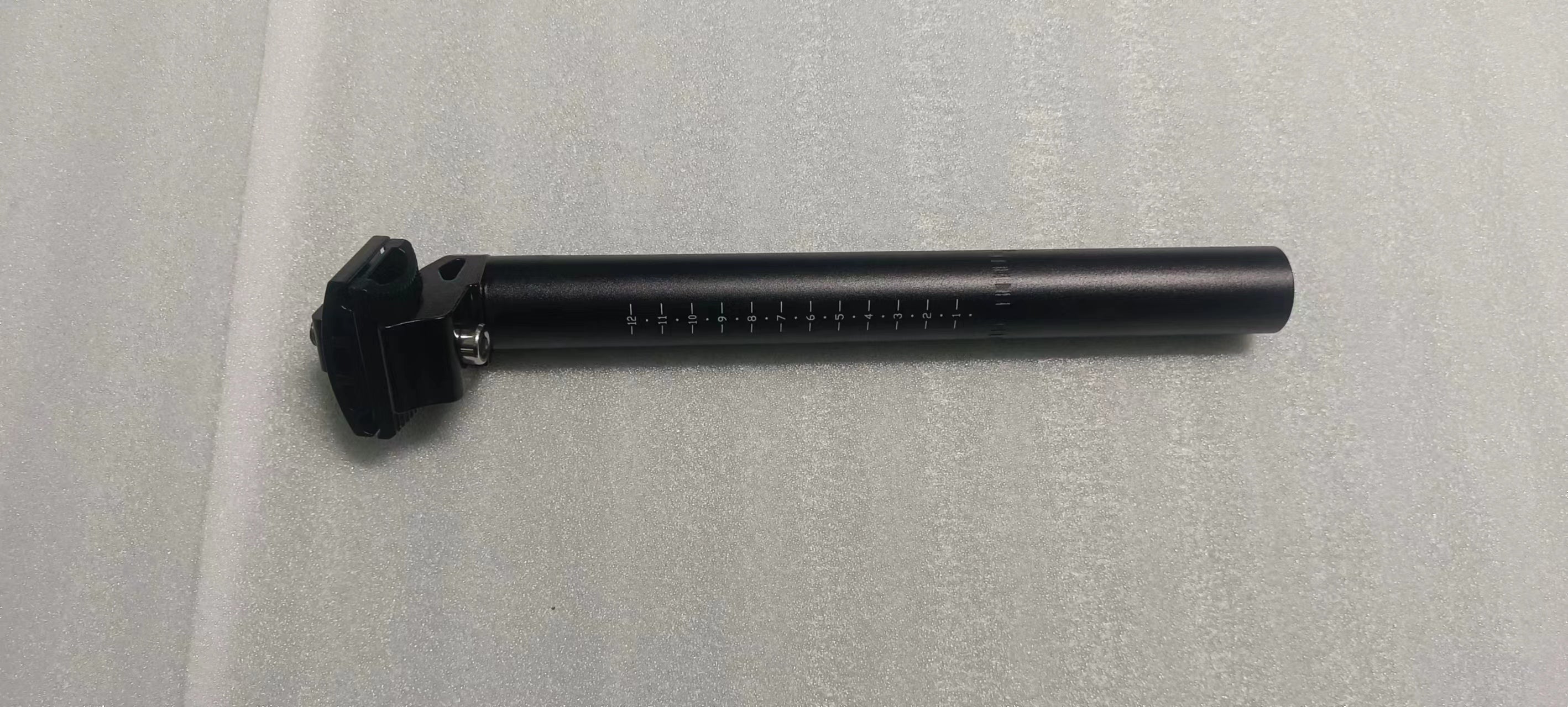 EU-LANKELEISI electric bike seatpost, adjustable and black, designed for LANKELEISI e-bikes, with sturdy metal construction.